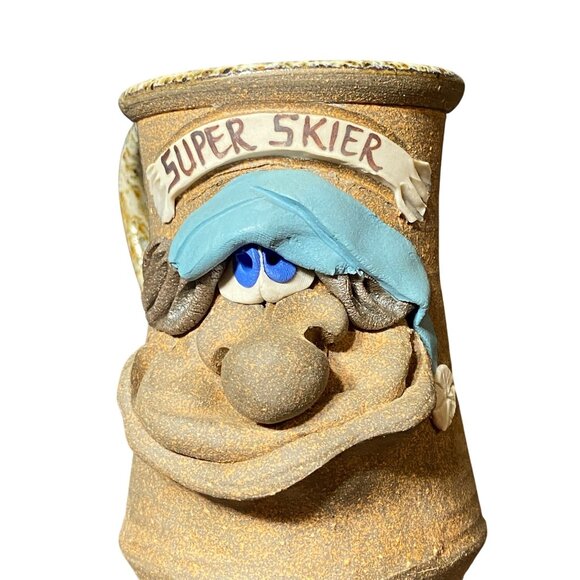 Handmade Ceramic Mug With Comical Super Skier Design & Blue Hat - Picture 2 of 7